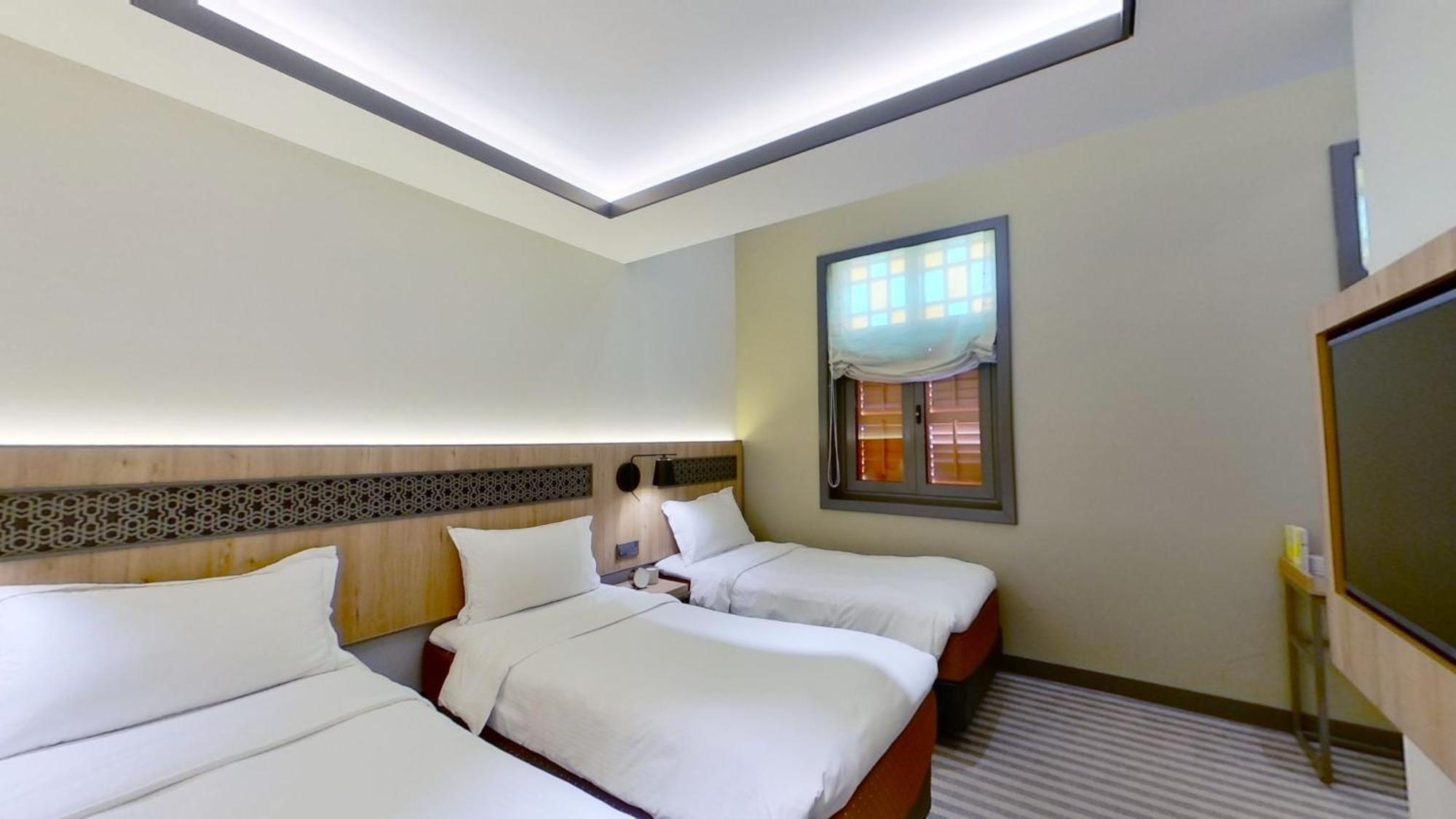 Deluxe Triple Room